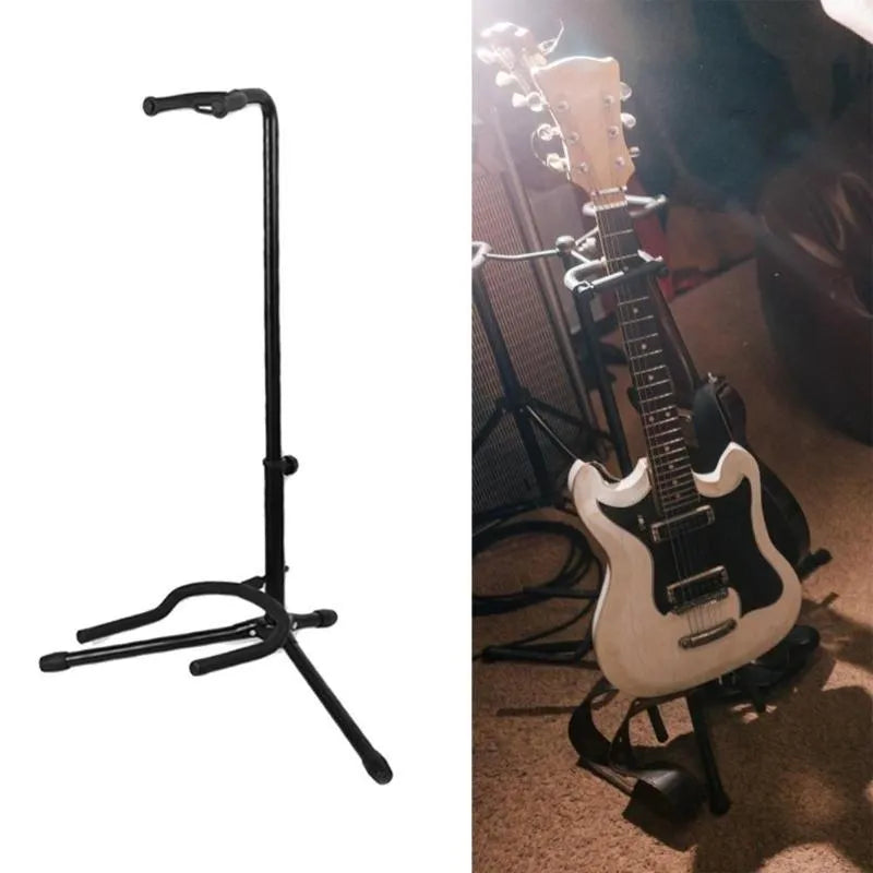Black metal guitar floor stand holding an acoustic guitar.