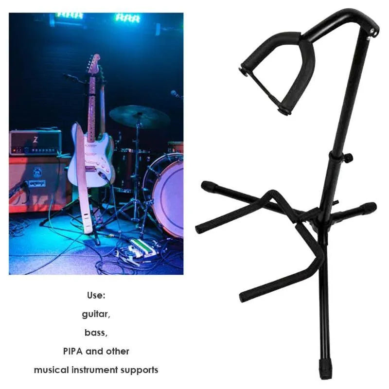 Black metal guitar floor stand holding an acoustic guitar.