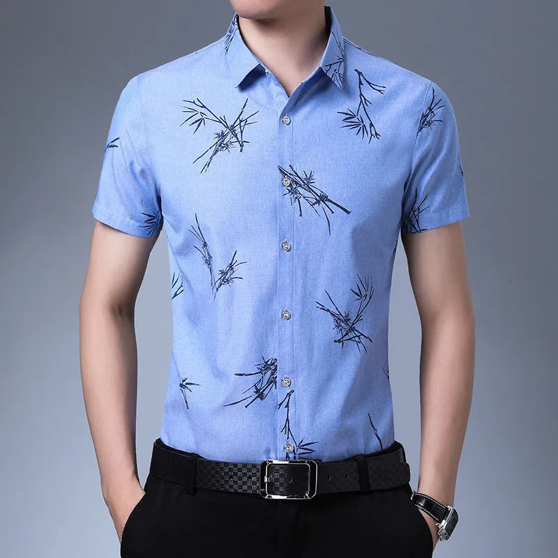 Men's printed slim fit short-sleeve shirt with pointed collar in blue – polyester blend no-iron fabric