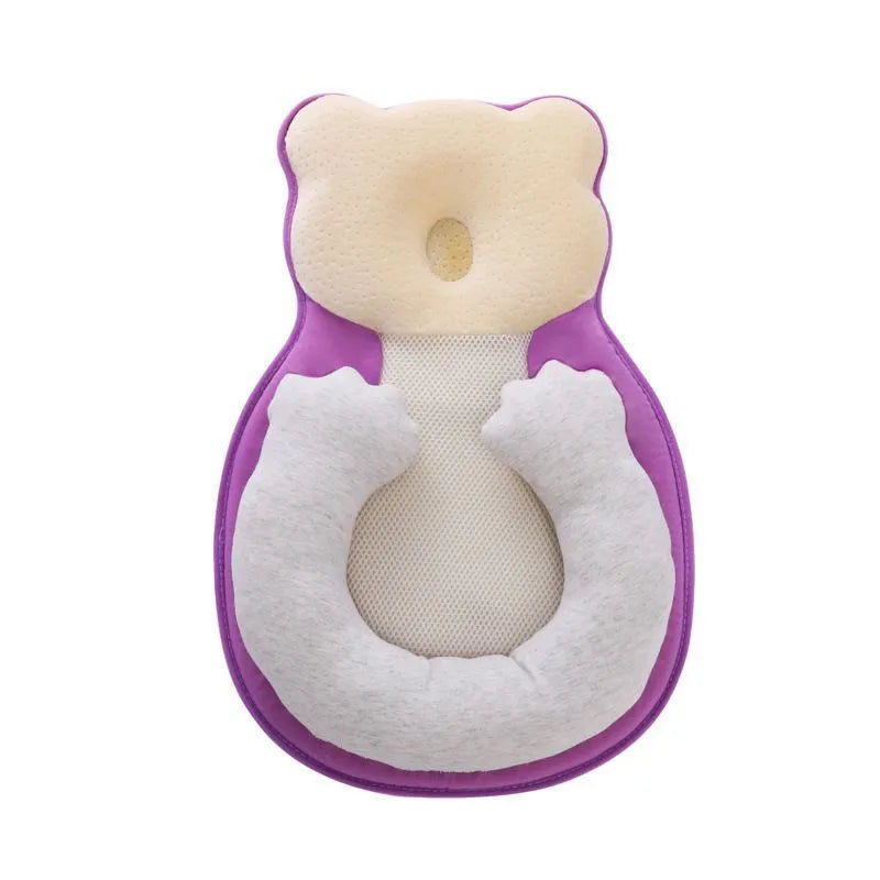 Portable baby flat sleep pillow with soft cotton surface in multiple colour options on a neutral background.