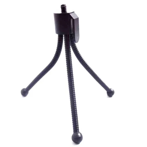 Small iron frame mini desktop tripod with folding legs and a ball head, shown alongside a camera.