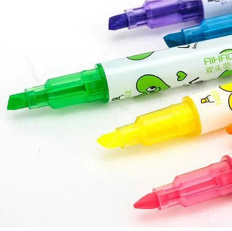 Six double-headed watercolour highlighters showing pink, orange, yellow, green, blue, and purple colours