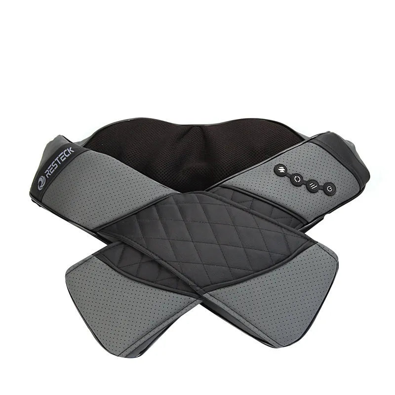 Grey electric massage shawl draped over shoulders for neck and back pain relief, with power cord attached