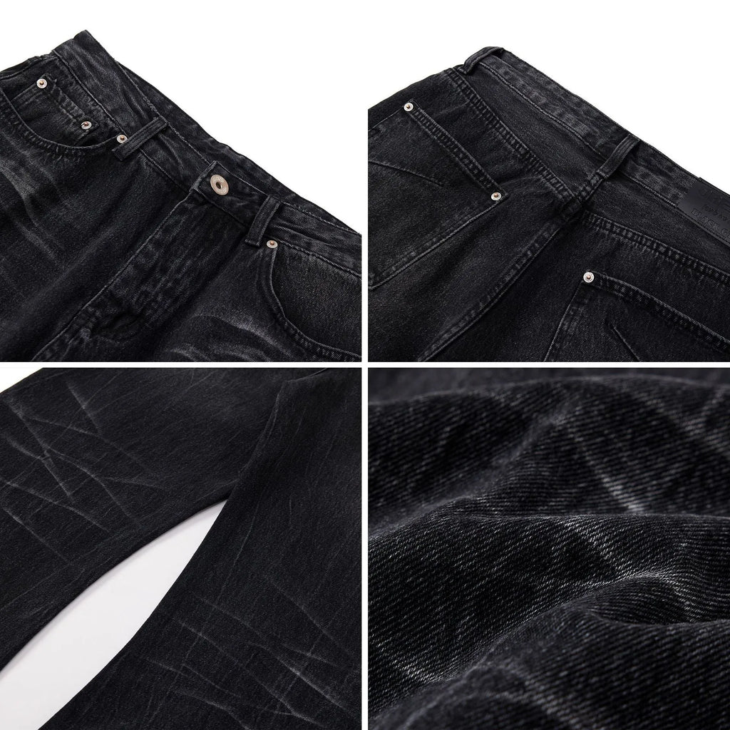 Black straight-leg men's jeans with a distressed lightning crack pattern on the legs.