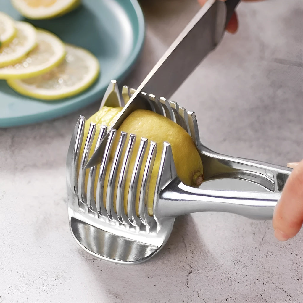 Silver plastic lemon slicer kitchen gadget on a countertop