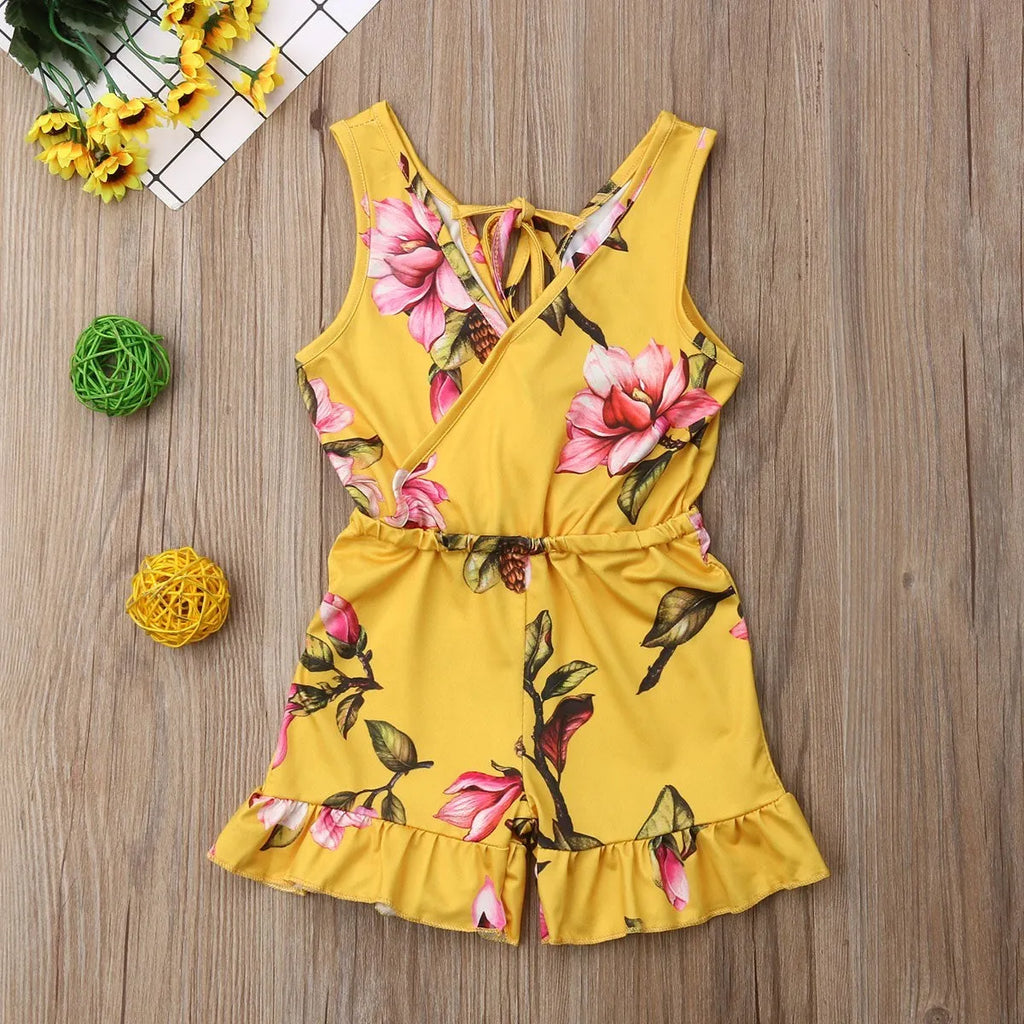 White cotton floral summer outfit for a baby girl with an elasticated waist