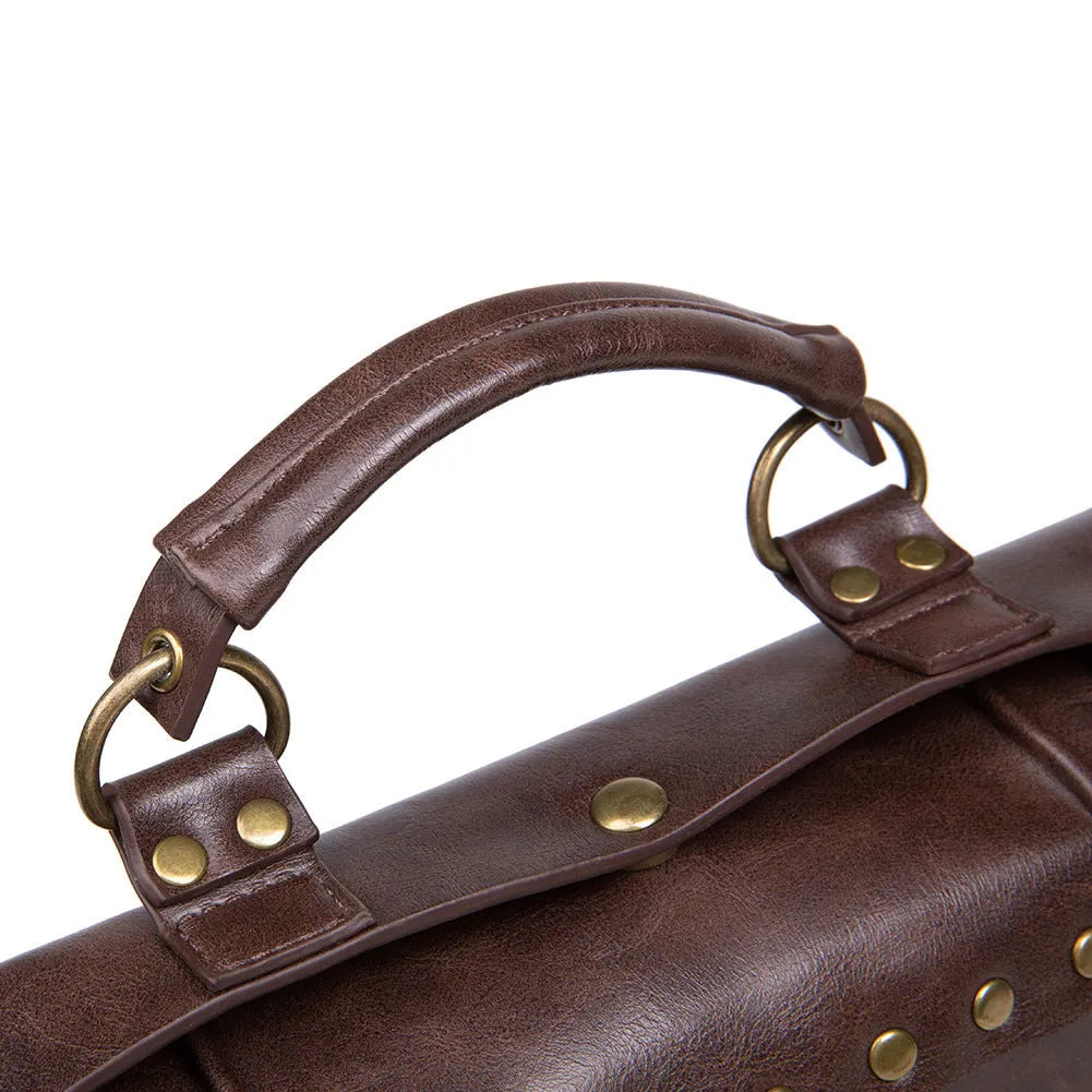 Bronze steampunk industrial retro style shoulder bag with metal hardware on a horizontal square pillow shape