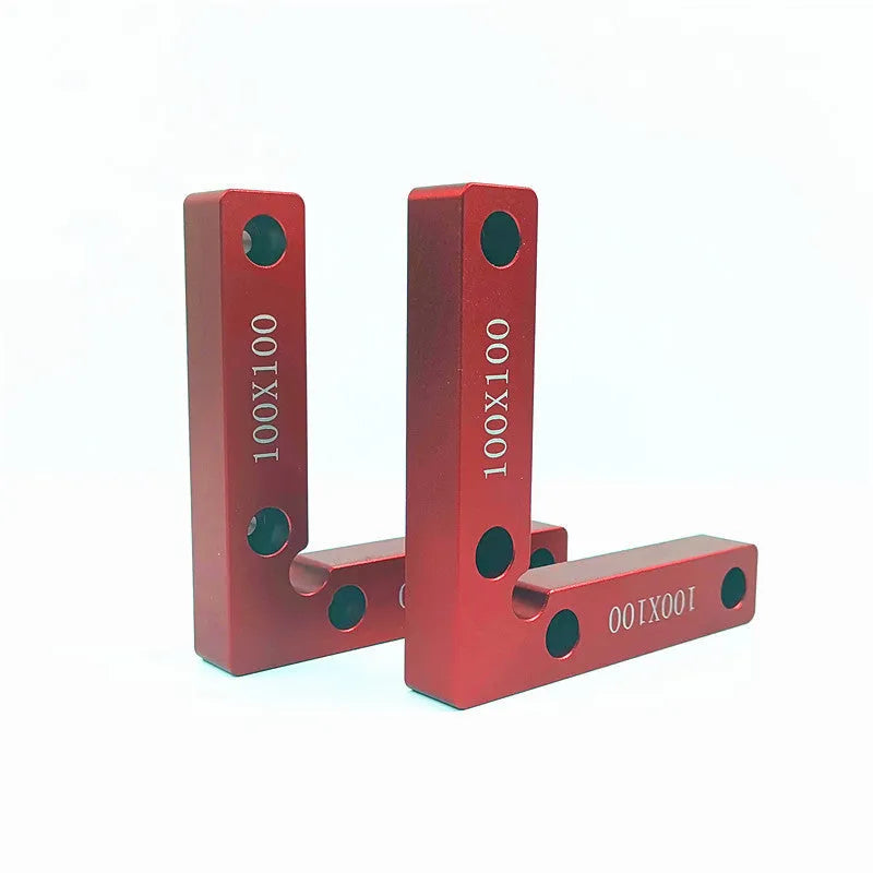Aluminium right angle positioning block for woodworking jigsaws on a workbench