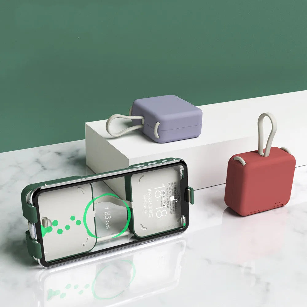 Handbag clip-on power bank with phone stand function in blue, green, red, or white.