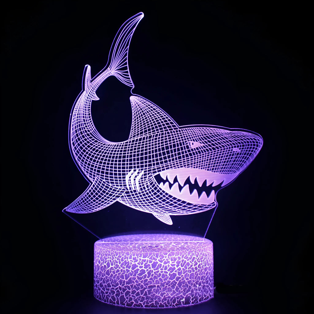 3D shark-shaped LED table lamp with remote control showing sixteen colour changing options