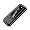 Black USB car FM Bluetooth receiver with LCD screen plugged into a car dashboard 12V socket.