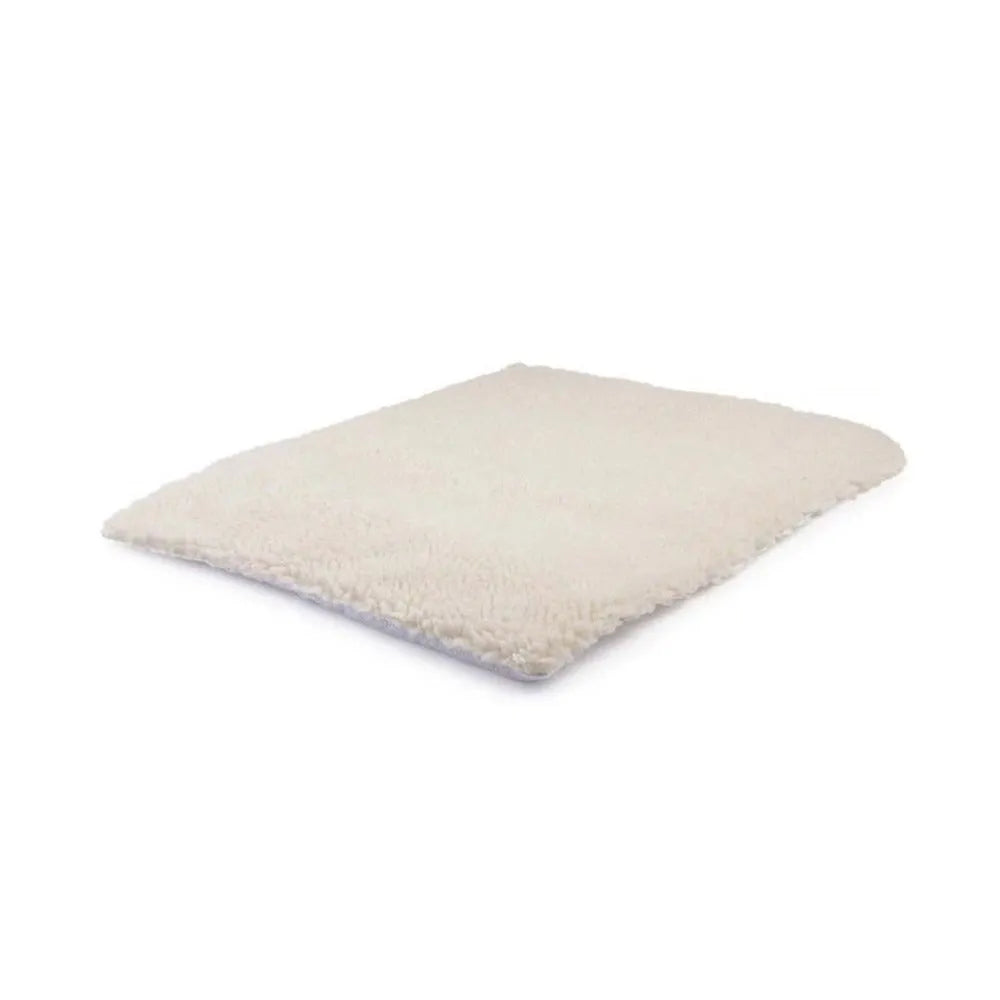 Beige self-heating pet blanket with faux lambswool on a dog bed, no electricity needed, size 64cm x 49cm