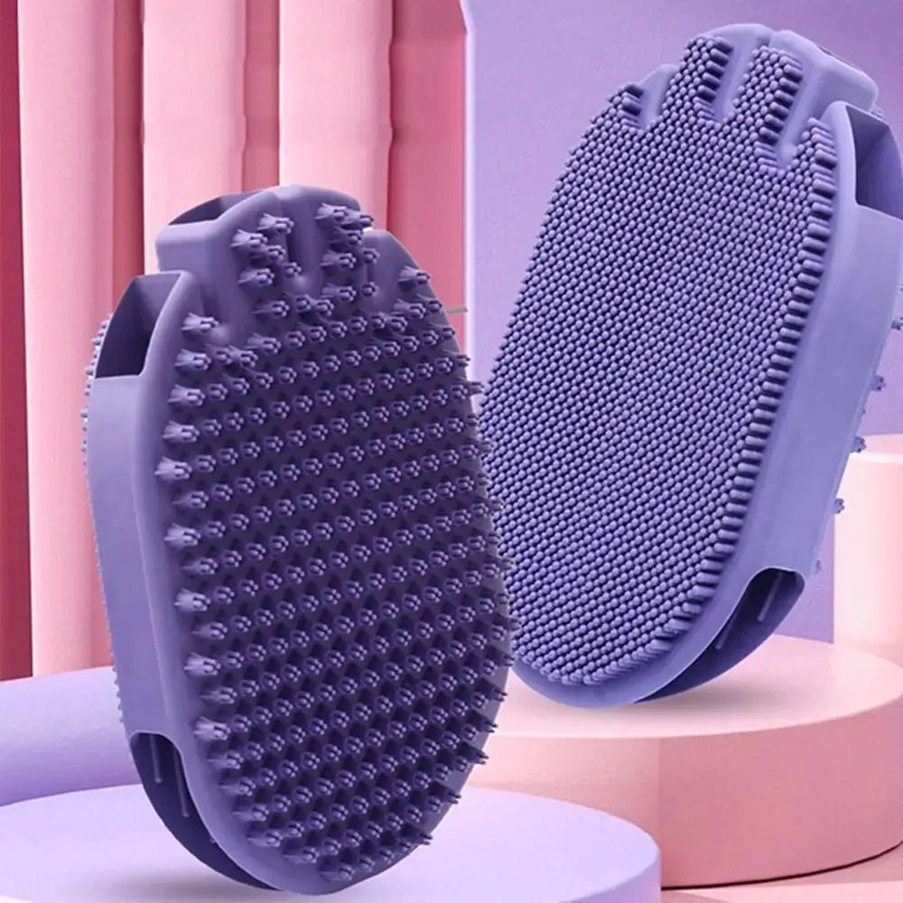 Purple dual-sided pet massage shampoo brush with soft TPR bristles and ergonomic handle