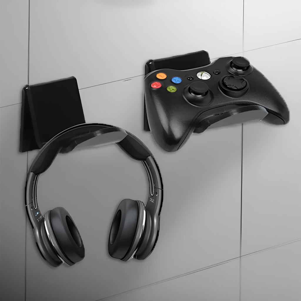 Universal game controller wall mount bracket in black plastic with gaming controller inserted