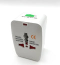 Compact white universal travel plug converter adapter for international sockets.