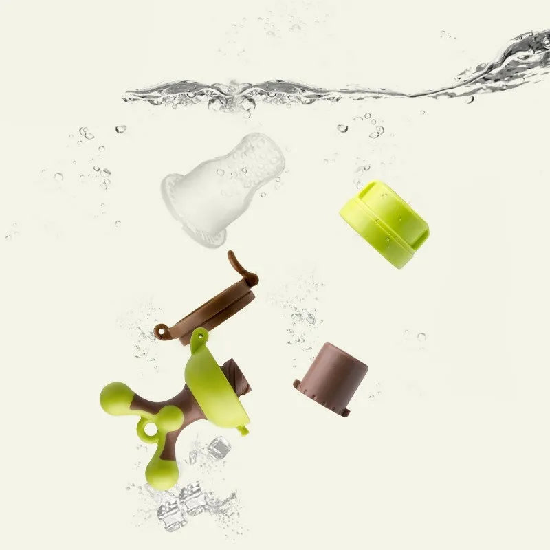 Green or purple baby bite trainer made from food-grade polypropylene with BPA-free silicone