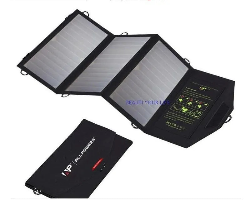 Black foldable solar panel charger with dual USB ports unfolded on a backpack.