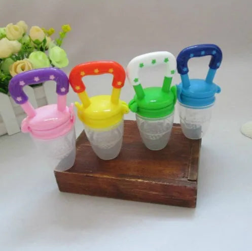 New baby silicone pacifier encapsulated food feeder in size M with blue silicone nipple