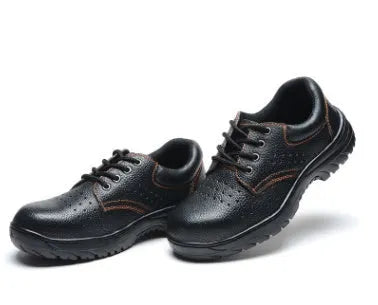Black antiskid safety work shoes with steel toe, embossed cowhide upper, on a white background