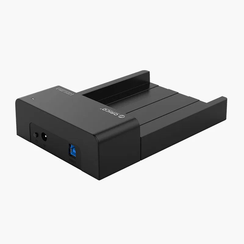 Black plastic 2.5-inch and 3.5-inch SATA hard drive enclosure with USB cable for portable storage conversion