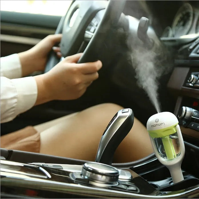 Compact portable car humidifier with air purifier and essential oil diffuser functions