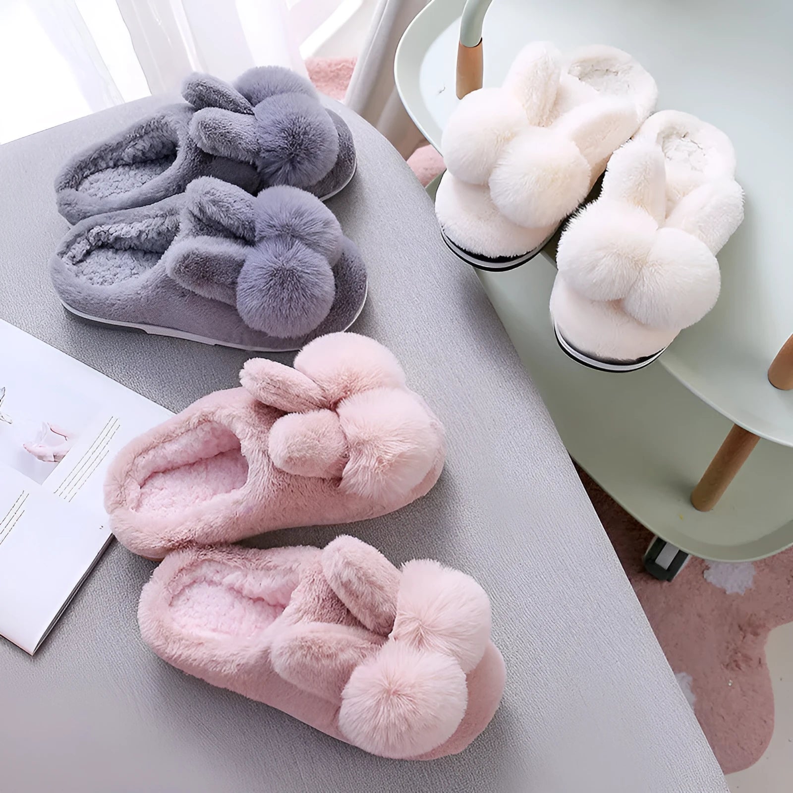 Women's rabbit fur winter slippers with high upper, floral detail, and sewn sole in creamy white.