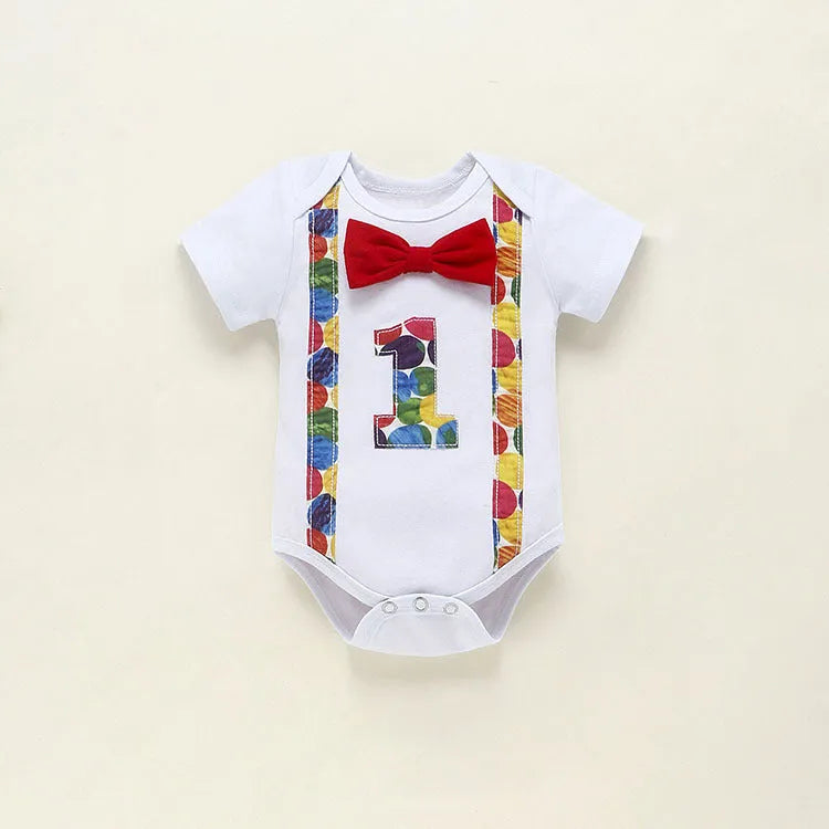 Cotton baby romper overalls in dinosaur print or dot patterns with shorts length and decorative straps