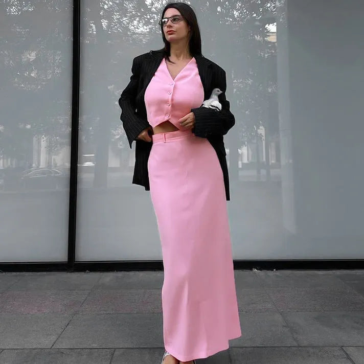 Pink polyester sleeveless vest and long split skirt suit for women