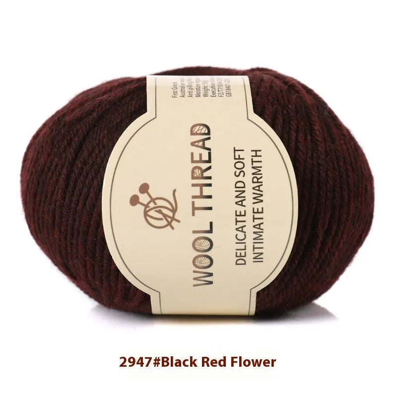 Roll of hand-knitting wool threads in various colours for baby garments with 10 knitting needles