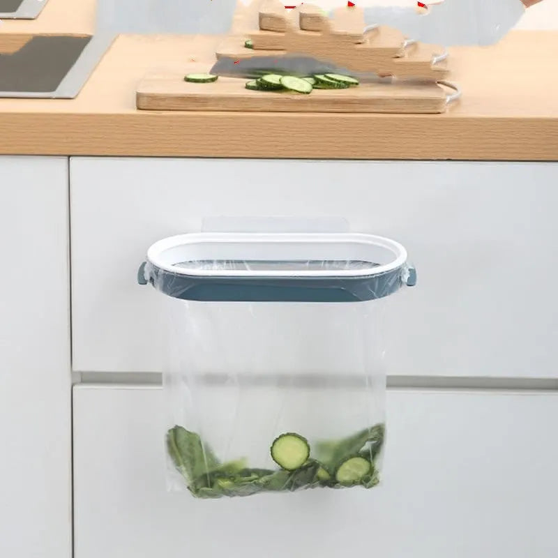 Blue plastic T-shaped kitchen cabinet storage rack for holding a roll of bin bags.