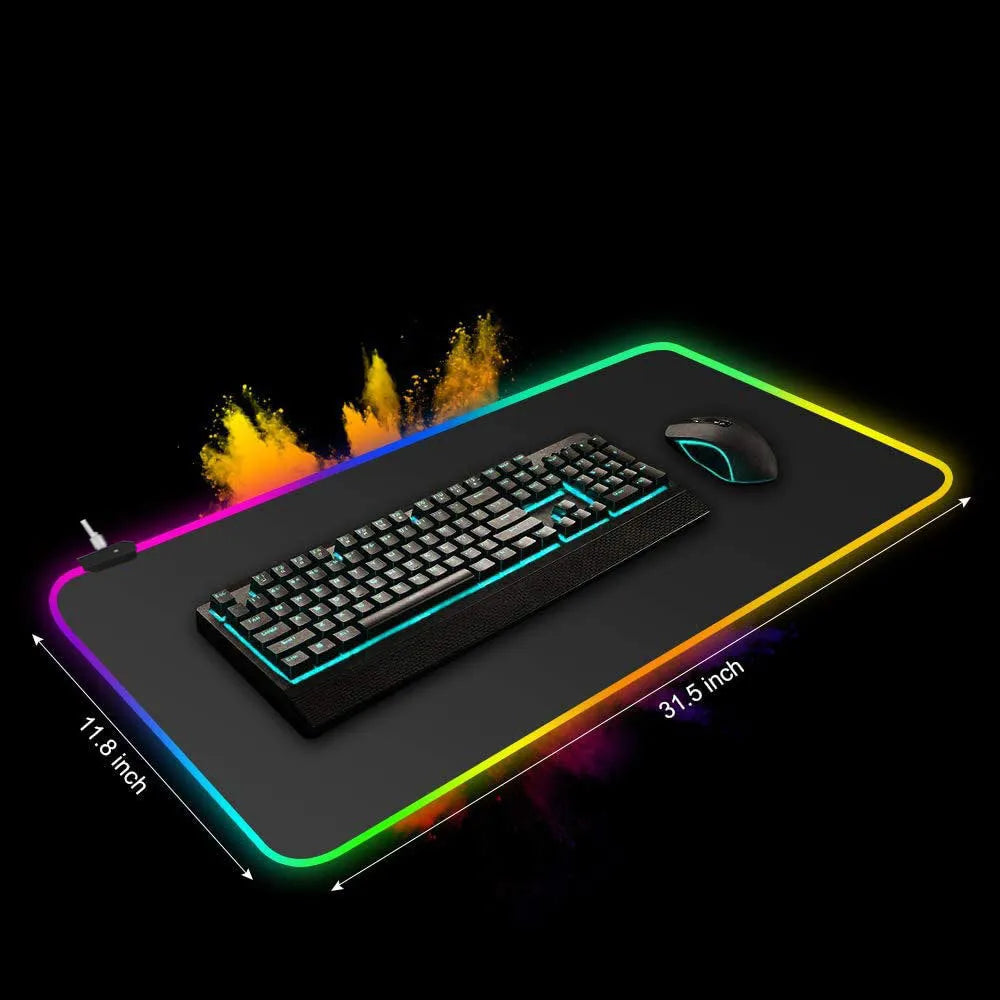 Symphony RGB luminous gaming mouse pad with starry sky pattern on a desk, showing USB cable.