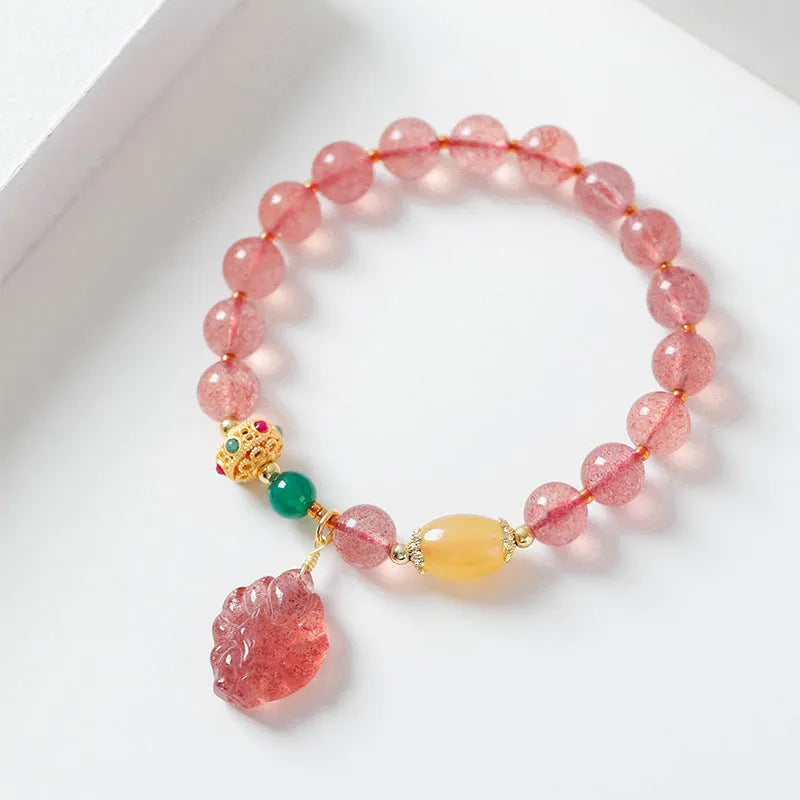 Women's strawberry quartz crystal bracelet with Nine Tail Fox beaded design