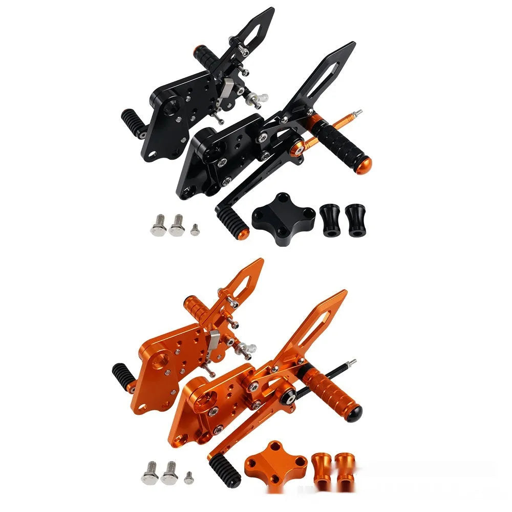 KTM Duke motorcycle pedal support assembly in black and orange for 125 200 250 390 models