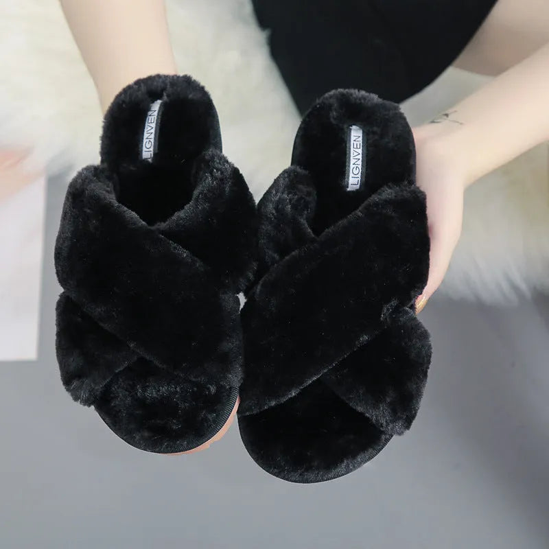 Cross open-toe fur slippers showing personalised toe design and patterned non-slip soles