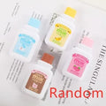 Cute bottle-shaped correction tape dispenser with 6 metres of white correction fluid.