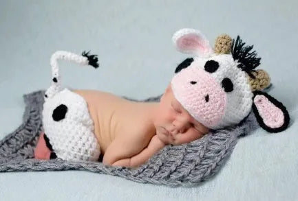 Hand-knitted white baby cow suit with matching hat for 0-3 month newborns