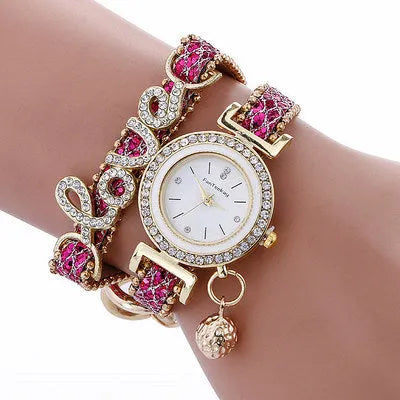 Sequin bracelet watch with round 25mm dial, alloy case and faux leather strap in black