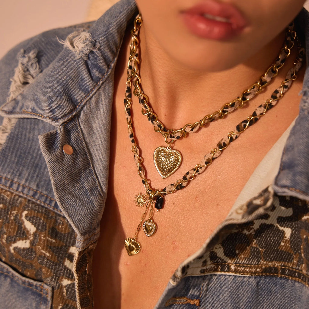 Women's stainless steel leopard love pendant necklace with geometric design and regular chain