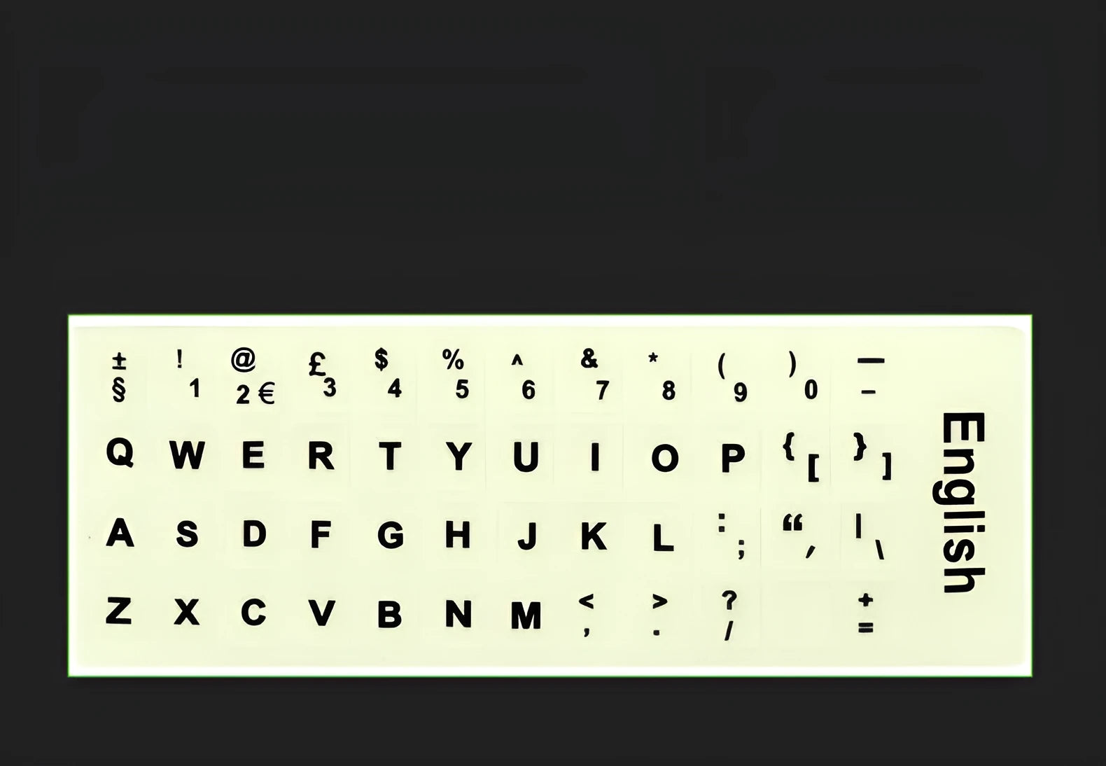 Yellow glowing keyboard stickers showing Arabic, Thai, Hebrew, French, Italian and German characters on PVC sheet