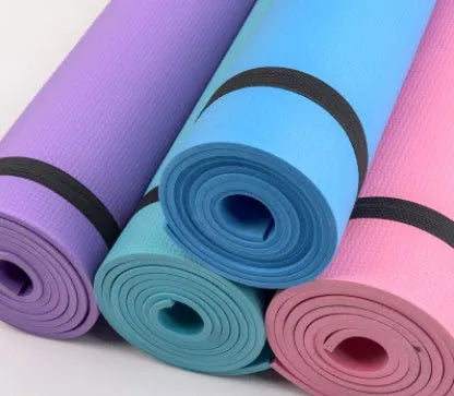 EVA fitness yoga mat in blue showing thickness and non-slip surface texture