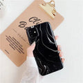 Marble mobile phone case for iPhone in black and white soft shell design, showing fade-resistant pattern