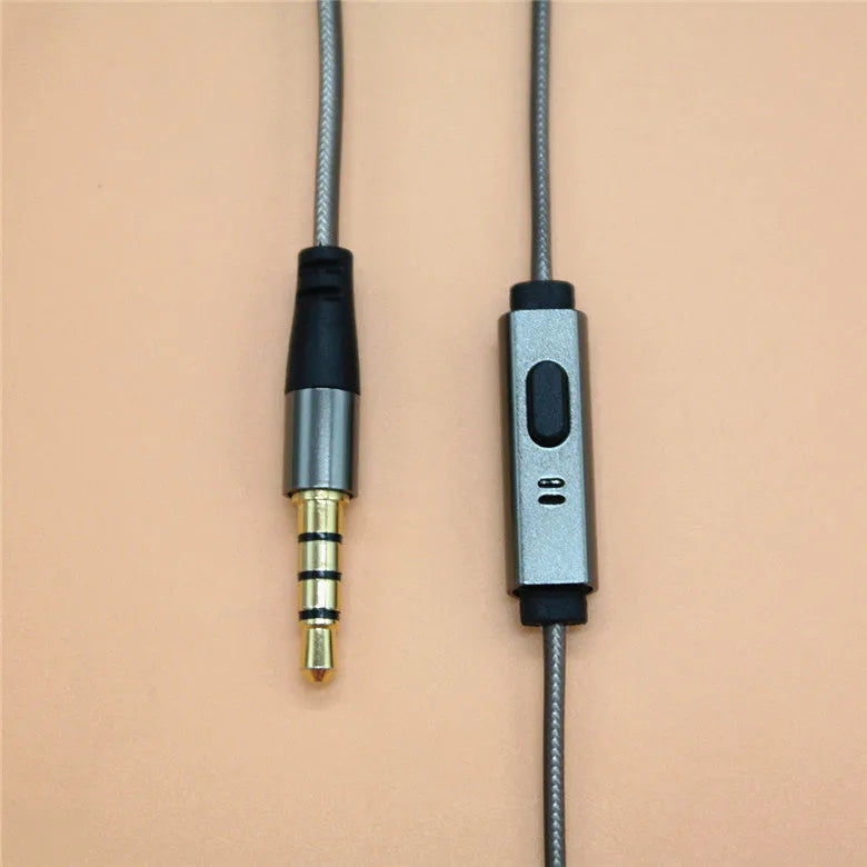 Titanium grey metal in-ear earphones with a detachable TPE cable and aluminium foil shielding.