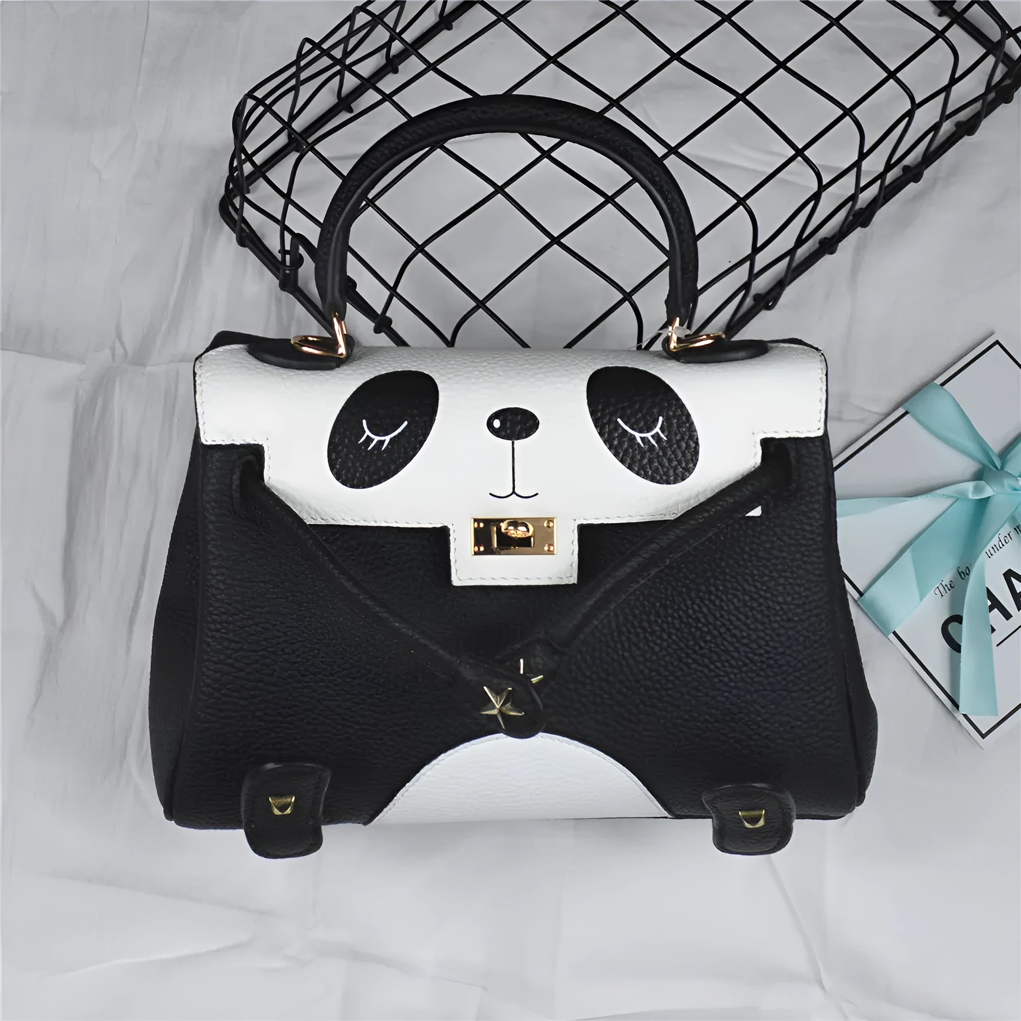 Women's cow leather panda print handbag in a horizontal square shape.