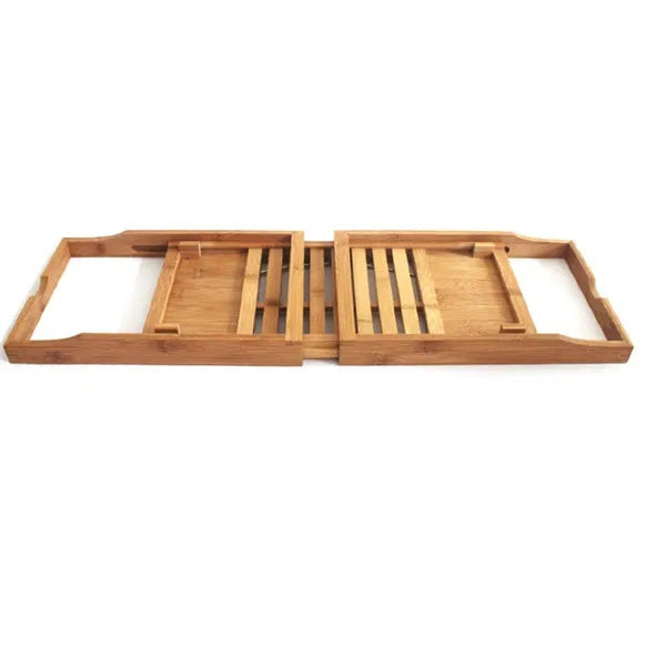Natural bamboo single-tier desktop shelf for bathroom storage on a bathtub ledge.