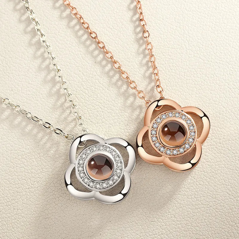 I love you 100 languages projection necklace, copper with gold plating, 50cm chain, pendant detail