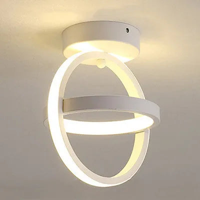 Modern round ceiling light with black finish and white acrylic shade, 21cm diameter.