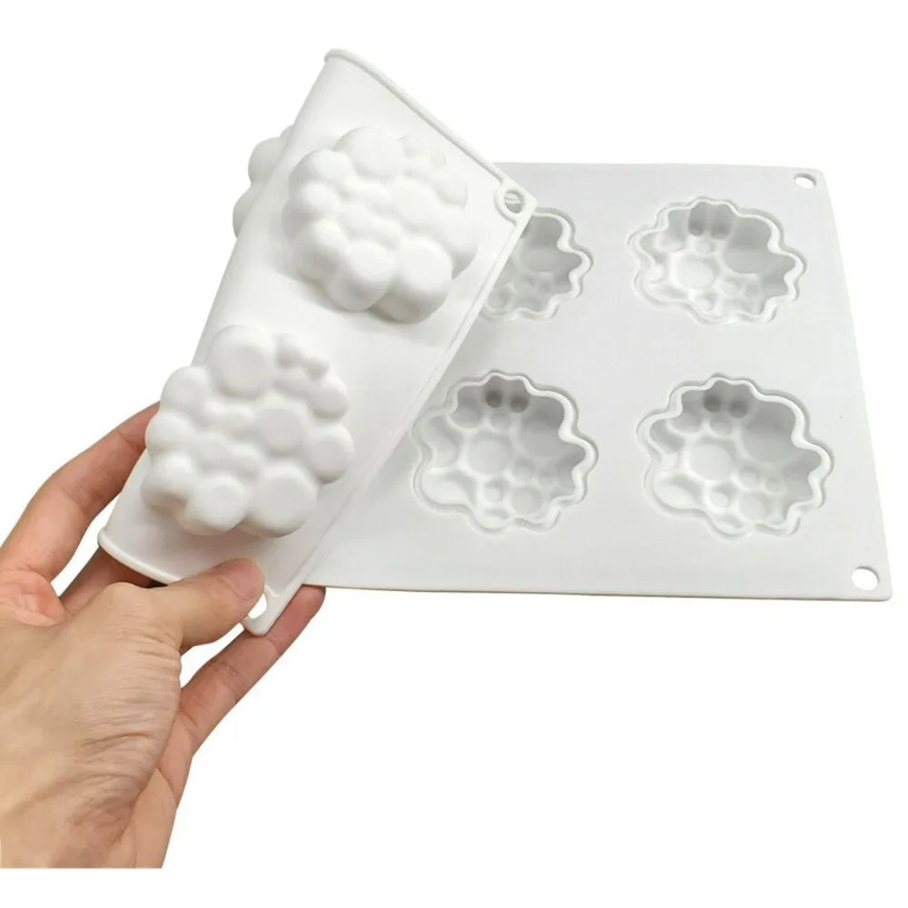 Round silicone cake mould with 8 bubble pattern design for baking and dessert preparation