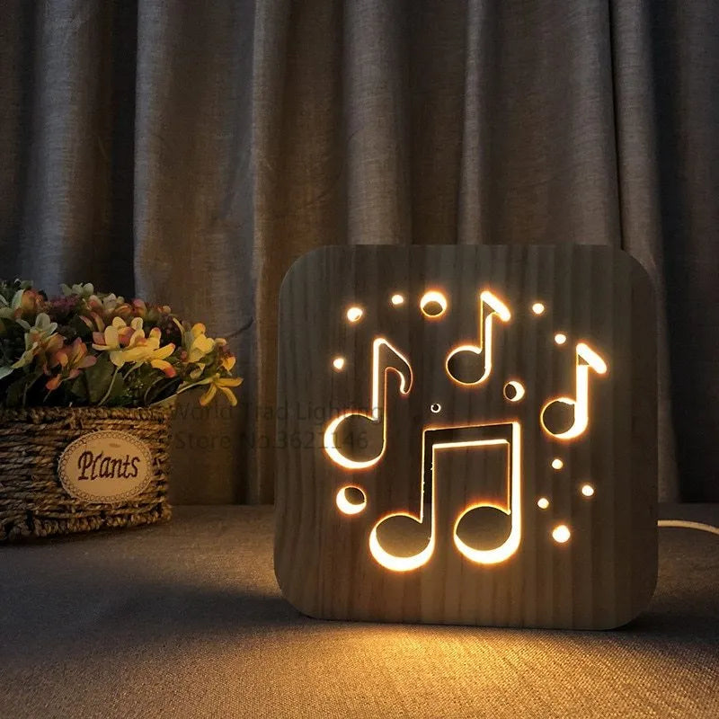 Square pine wood USB-powered LED lamp emitting warm white 3D light on a table.
