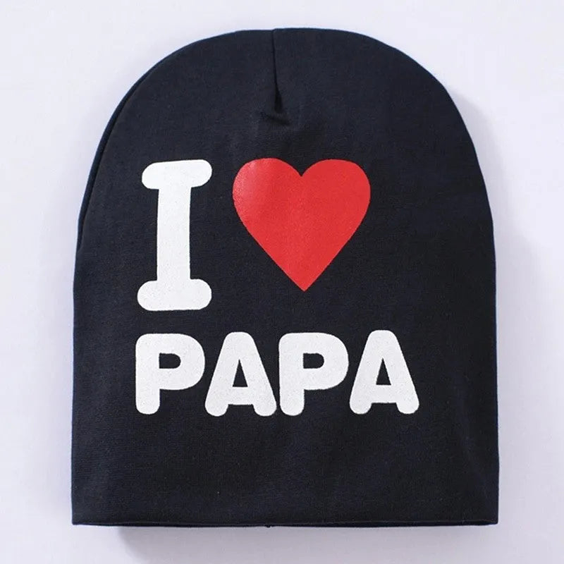Cotton and Lycra baby beanie hat in solid colour with embroidered Love mama or Love papa text pattern