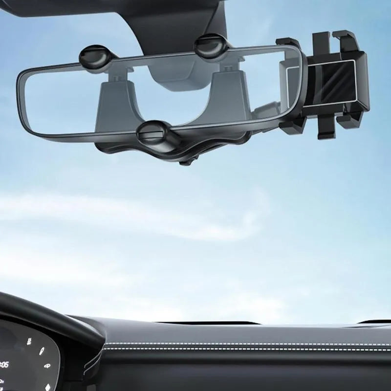 Black rearview mirror phone holder with rotating head and telescopic arm mounted on a car mirror.
